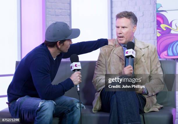 Mark Wahlberg and Will Ferrell are photographed during an interview at Kiss FM Studio's on November 17, 2017 in London, England.