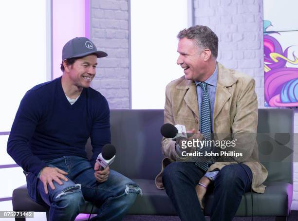 Mark Wahlberg and Will Ferrell are photographed during an interview at Kiss FM Studio's on November 17, 2017 in London, England.