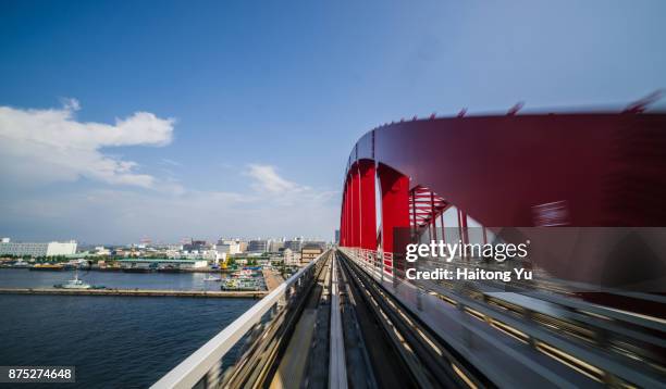 train crossing kobe bridge - kobe japan stock pictures, royalty-free photos & images