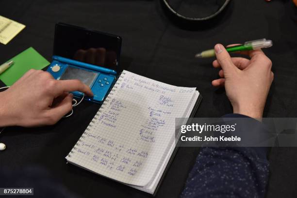 Competitor makes notes at the Pokemon European International Championships at ExCel on November 17, 2017 in London, England. Thousands of competitors...