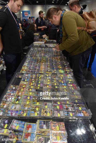 Attendees purchase Pokemon merchandise at the Pokemon European International Championships at ExCel on November 17, 2017 in London, England....