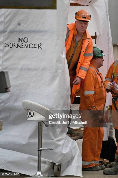 Group of workers gather at the entrance gate to the Burntisland yard of engineering company BiFab, where staff are continuing a work-in despite the...