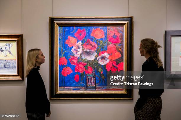 Sir Robin Philipson's 'Red Poppies on a Blue Background' goes on view as part of Sotheby's Scottish Art sale at Sotheby's on November 17, 2017 in...