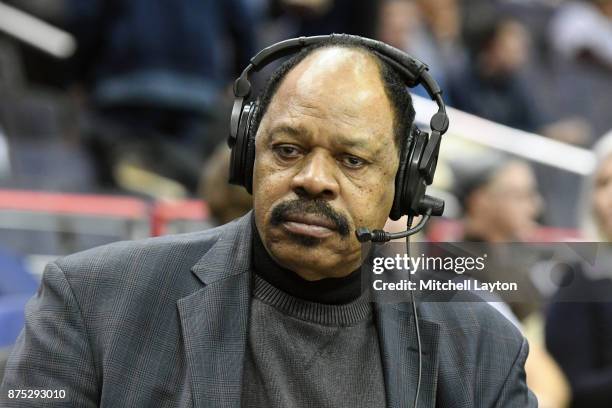 Former NBA player and Jacksonville Dolphins radio announcer Artis Gilmore on the air during a college basketball game against the Georgetown Hoyas at...