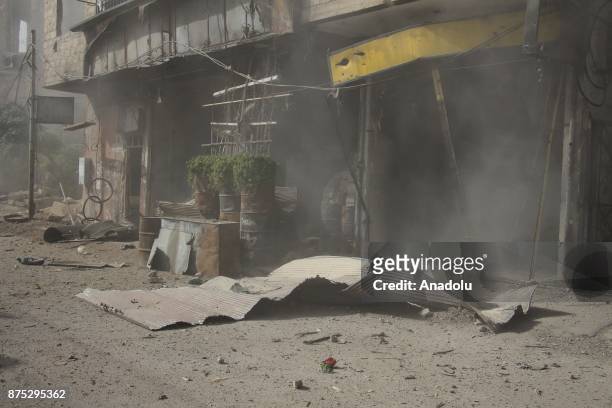 Damaged buildings are seen after Assad regime's warcrafts carry out airstrikes over residential areas of Arbin town of the Eastern Ghouta region of...