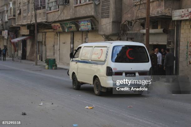 An ambulance is seen after Assad regime's warcrafts carry out airstrikes over residential areas of Arbin town of the Eastern Ghouta region of...