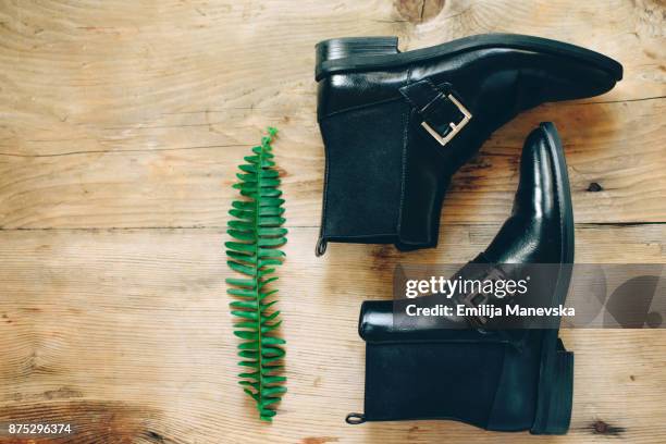 pair of black woman shoes - black boot stock pictures, royalty-free photos & images