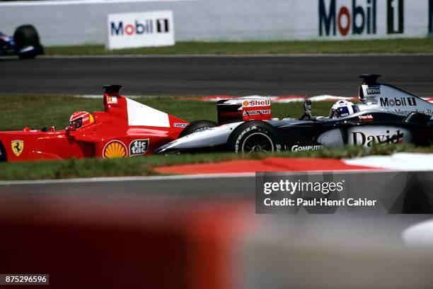 David Coulthard, McLaren-Mercedes MP4/15, Grand Prix of France, Circuit de Nevers Magny-Cours, 02 July 2000. David Coulthard giving the middle finger...