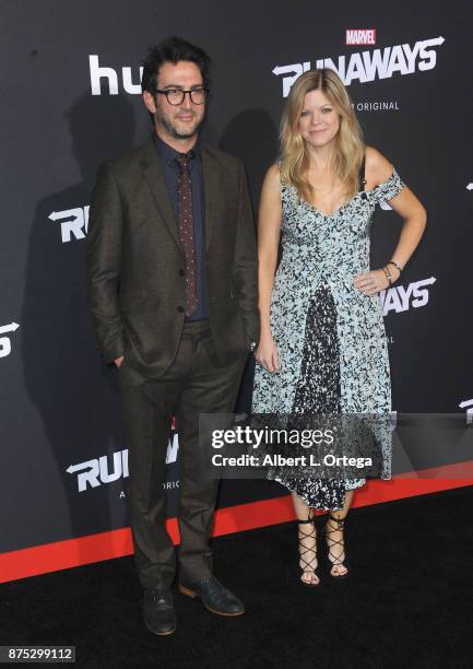 Producers Josh Schwartz and Stephanie Savage arrive for the Premiere Of Hulu's "Marvel's Runaways" held at Regency Bruin Theatre on November 16, 2017...