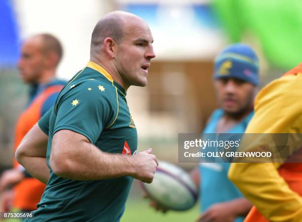 Australia's number 8 Sean McMahon jogs at a training session at Twickenham Stadium in southwest London on November 17 ahead of the autumn...