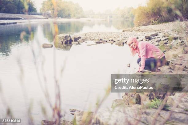 millennial pink young woman - millennial pink stock pictures, royalty-free photos & images