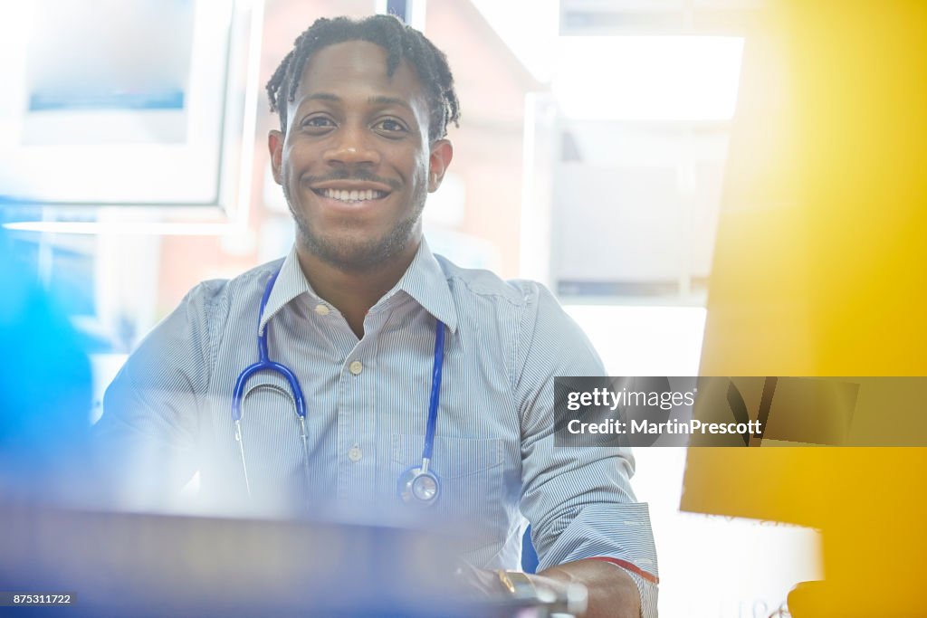 Junior doctor smiling to camera