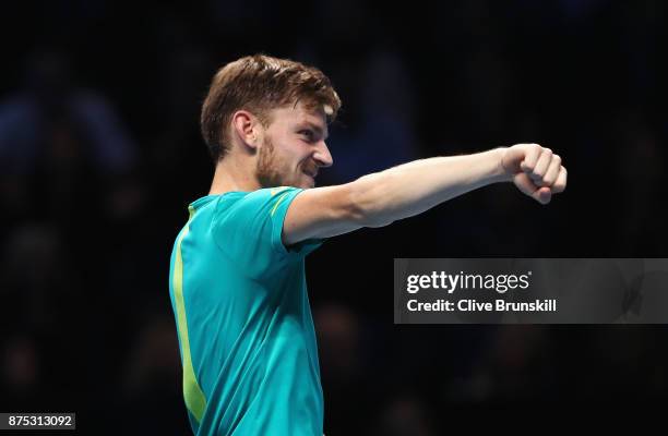 David Goffin of Belgium celebrates victory in his Singles match against Dominic Thiem of Austria during day six of the Nitto ATP World Tour Finals at...