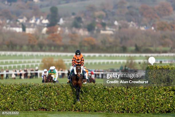 Tom Scudamore riding Kingswell Theatre on their way to winning The Glenfarclas Cross Country Handicap Steeple Chase at Cheltenham racecourse on...