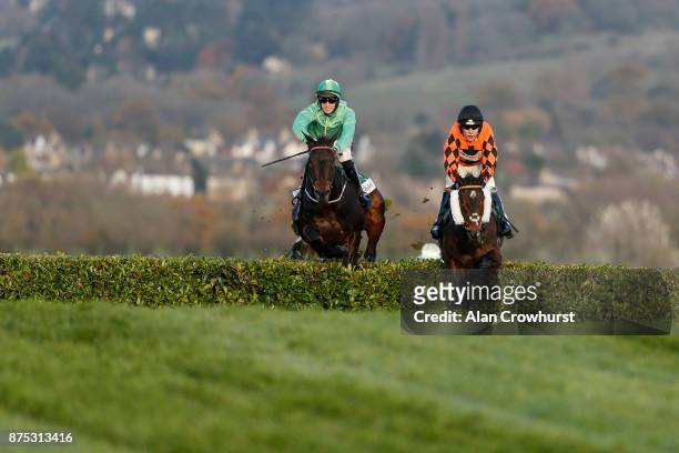 Tom Scudamore riding Kingswell Theatre on their way to winning The Glenfarclas Cross Country Handicap Steeple Chase at Cheltenham racecourse on...