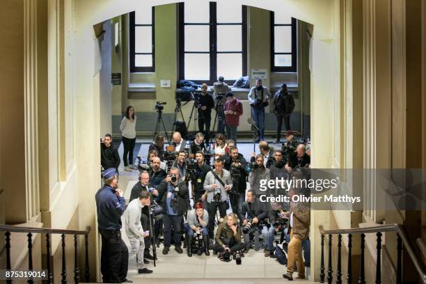 Members of the international press wait for former minister-president of Catalonia, Carles Puigdemont and former members of his regional government...