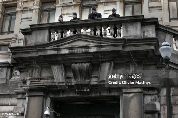 Police secure the courthouse while former minister-president of Catalonia, Carles Puigdemont and members of his regional government appear in front...