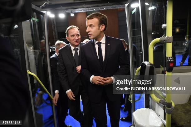 France's President Emmanuel Macron and Sweden's Prime Minister Stefan Lofven travel by bus to visit the Volvo Campus Lundby of the Swedish carmaker...