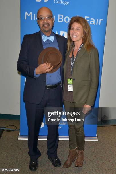 Musician/author James McBride and Leslie Miller Sarontz attend The Miami Book Fair at Miami Dade College Wolfson - Chapman Conference Center on...