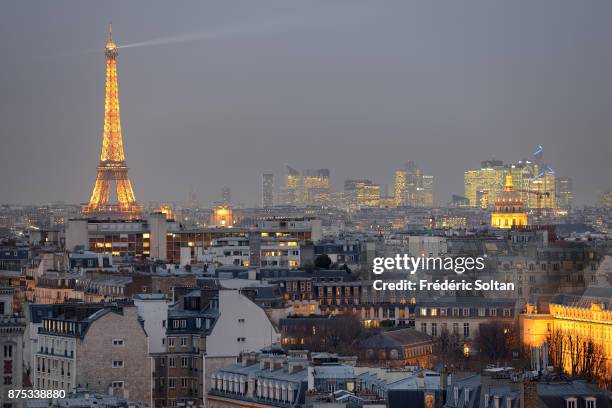 View of Paris. View of the Eiffel Tower and La Défense , a major business district of the Paris Metropolitan Area and of the Île-de-France region on...