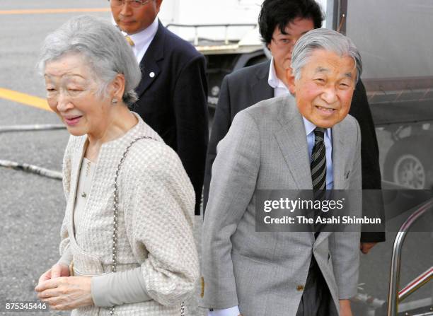 Emperor Akihito and Empress Michiko are seen on departure at Yoron Airport during their visit to Yoronjima Island on November 17, 2017 in Yoron,...