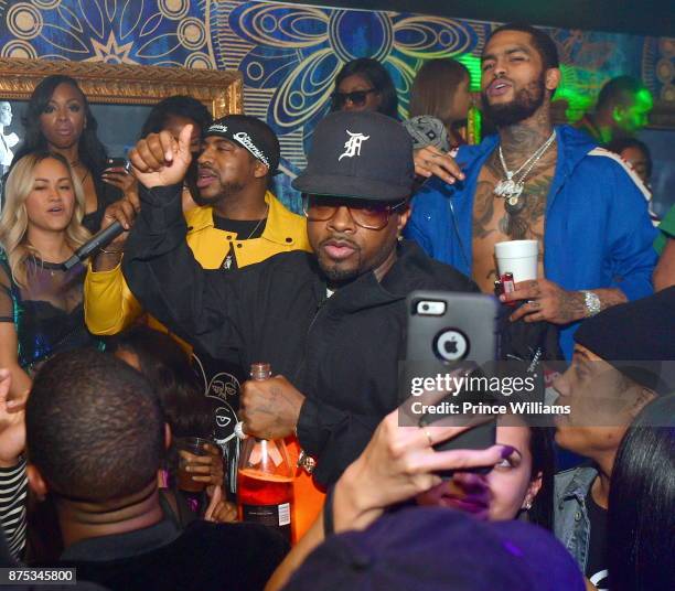 Holiday, Jermaine Dupri and Dave East attend DJ Holiday Birthday Celebration at Amora Lounge on November 16, 2017 in Atlanta, Georgia.