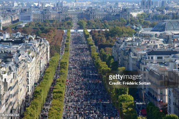 An elevated view as tourists and Parisians enjoy the Champs Elysées during the 2016 car-free day organised in Paris across 45% of the area of the...