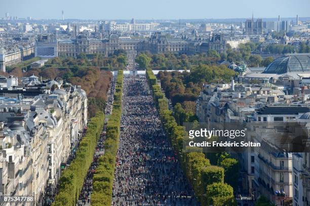 An elevated view as tourists and Parisians enjoy the Champs Elysées during the 2016 car-free day organised in Paris across 45% of the area of the...