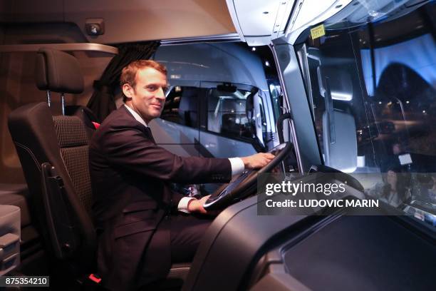 France's President Emmanuel Macron inspects a Renault truck during a visit to the Volvo Campus Lundby of the Swedish carmaker on the sidelines of the...