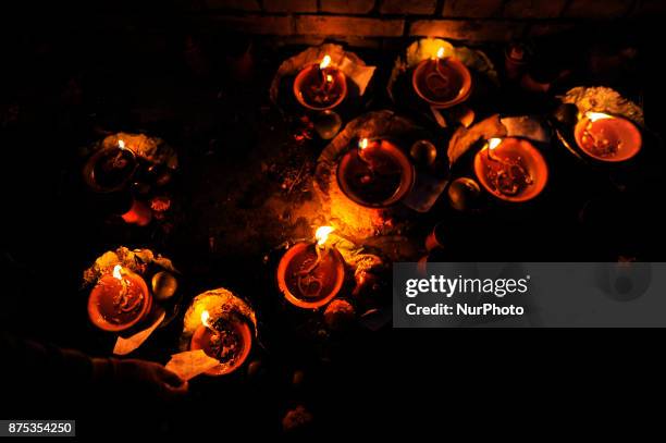 Nepalese devotees offered oil lamps on the bank of Bagmati river on the occasion of Bala Chaturdashi festival celebrated in Kathmandu, Nepal on...