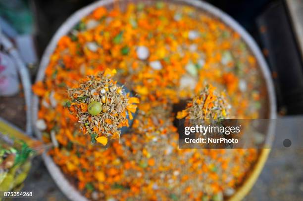 Street vendor selling holy grains 'Satbij' mixed of 7 types of grain at the premises of Pashupati temple on the occasion of Bala Chaturdashi festival...