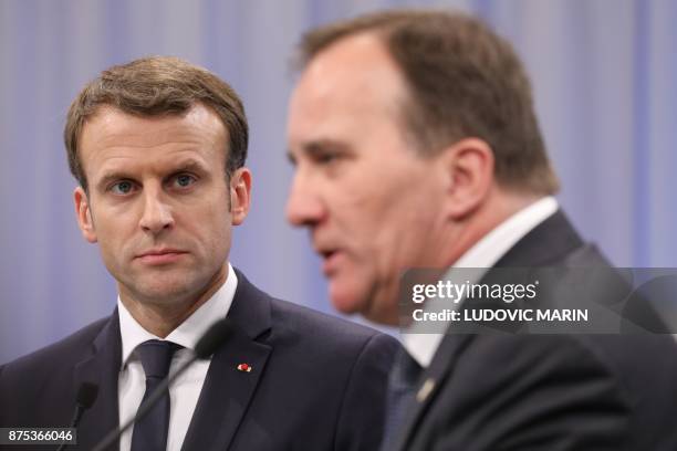 France's President Emmanuel Macron and Sweden's Prime Minister Stefan Lofven address a press conference during a visit to the Volvo Campus Lundby of...
