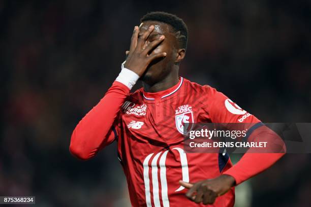 Lille's French-Ivorian forward Nicolas Pepe celebrates after scoring a goal during the French L1 football match between Lille and Saint Etienne at...