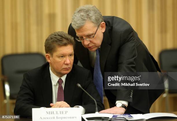 Gazprom's CEO Alexey Miller listens to economist Alexey Kudrin during a meeting with members of the border of trustees of the Mariinsky Theatre...