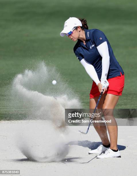 Marina Alex of the United States plays a shot from a bunker on the sixth hole during round two of the CME Group Tour Championship at the Tiburon Golf...