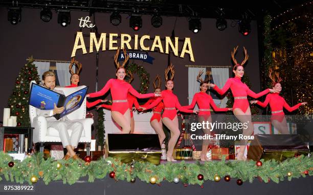 Derek Hough and performers onstage at Derek Hough Hosts The Americana at Brand Tree Lighting Presented By BMW on November 16 in Glendale, California...