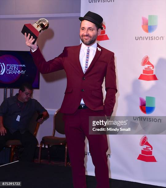 Eduardo Cabra poses with the award for Producer of the Year in the press room during The 18th Annual Latin Grammy Awards at MGM Grand Garden Arena on...