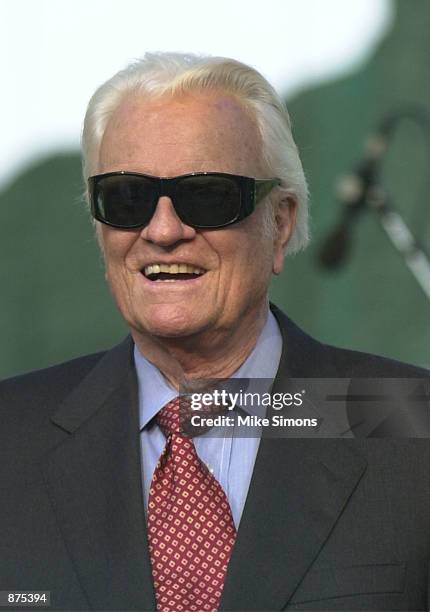 The Reverend Billy Graham appears onstage with sunglasses during the Billy Graham Mission June 29,2002 in Cincinnati, OH. Graham wore the sunglasses...