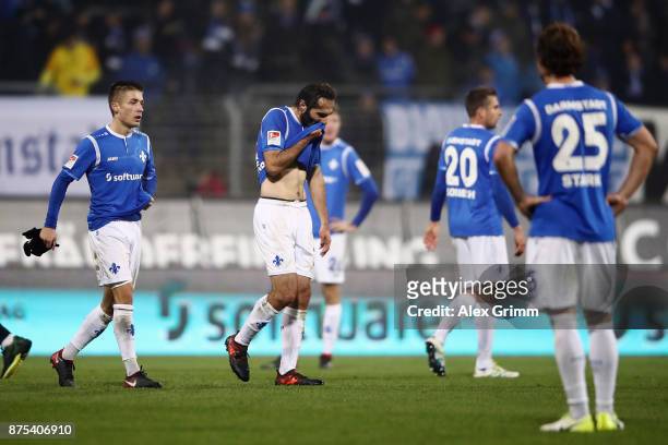 Hamit Altintop of Darmstadt and team mates react after the Second Bundesliga match between SV Darmstadt 98 and SV Sandhausen at...