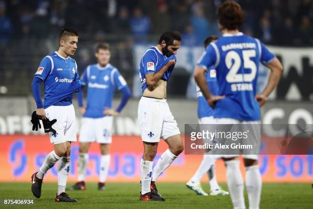 Hamit Altintop of Darmstadt and team mates react after the Second Bundesliga match between SV Darmstadt 98 and SV Sandhausen at...