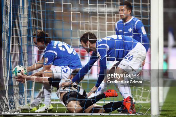 Players of Darmstadt get the ball after Patrick Banggaard scored his team's first goal during the Second Bundesliga match between SV Darmstadt 98 and...