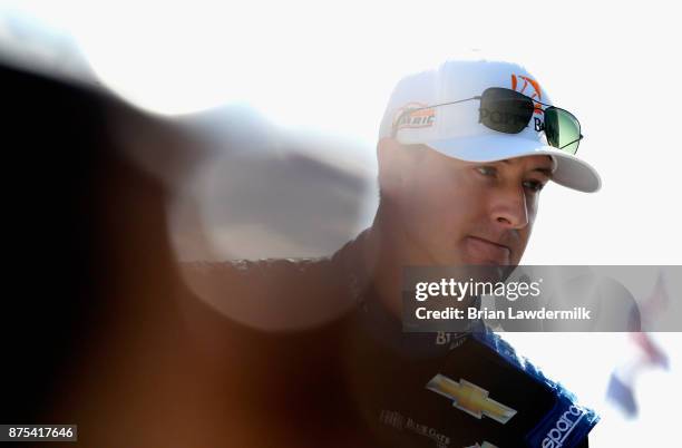 Daniel Hemric, driver of the Poppy Bank Chevrolet, stands in the garage area during practice for the NASCAR XFINITY Series Championship Ford EcoBoost...