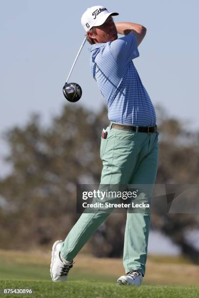 Derek Fathauer of the United States plays his tee shot on the 16th hole during the first round of The RSM Classic at Sea Island Golf Club Seaside...