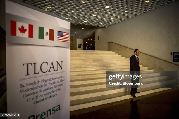 Security officer stands during the fifth round of North American Free Trade Agreement renegotiations in Mexico City, Mexico, on Friday, Nov. 17,...