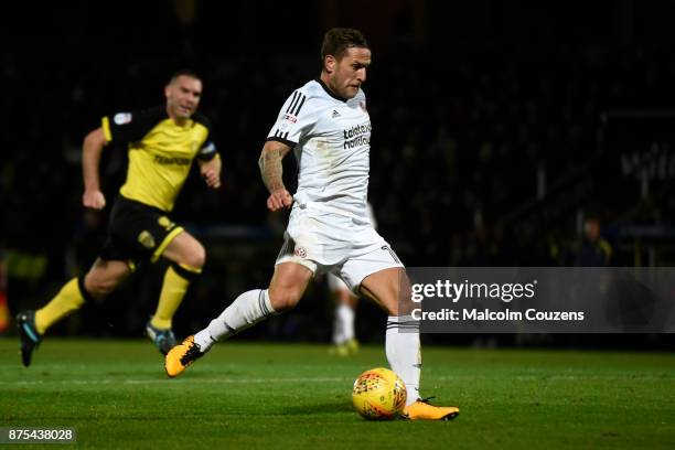 Billy Sharp of Sheffield United scores his sides second goal during the Sky Bet Championship match between Burton Albion and Sheffield United at...