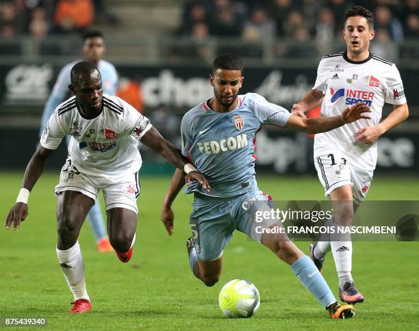 Monaco's Brazilian defender Jorge outruns Amiens' Senegalese forward Pape Moussa Konate during the French L1 Football match Amiens vs Monaco on...