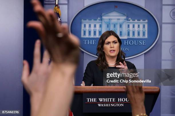 White House Press Secretary Sarah Huckabee Sanders takes reporters' questions during a news conference in the Brady Press Briefing Room at the White...