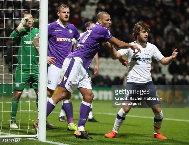 Bolton Wanderers' Darren Pratley pushes Preston North End's Ben Pearson before a corner during the Sky Bet Championship match between Preston North...