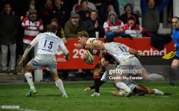 Gloucester wing Ollie Thorley goes over to score the first Gloucester try during the Aviva Premiership match between Gloucester Rugby and Saracens at...