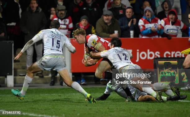 Gloucester wing Ollie Thorley goes over to score the first Gloucester try during the Aviva Premiership match between Gloucester Rugby and Saracens at...